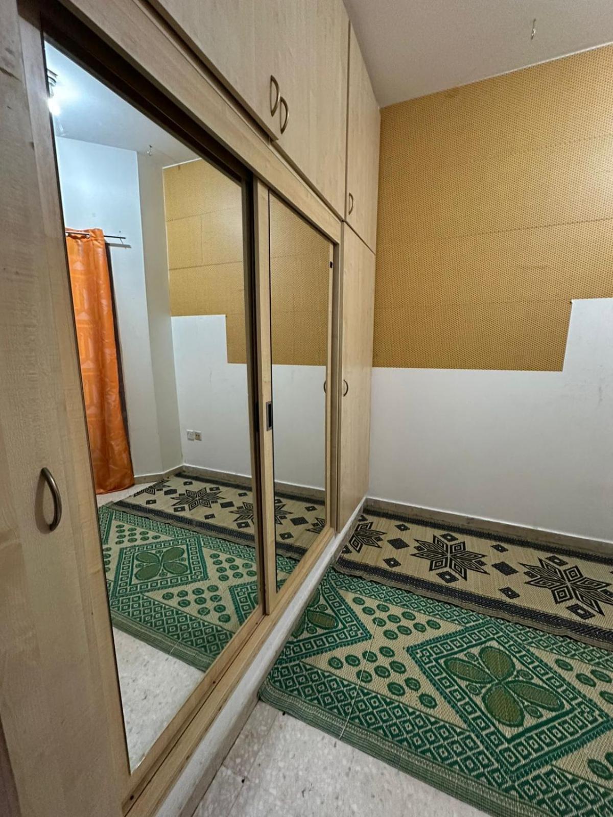 Built-in Cabinet With Balcony Homestay Abu Dhabi